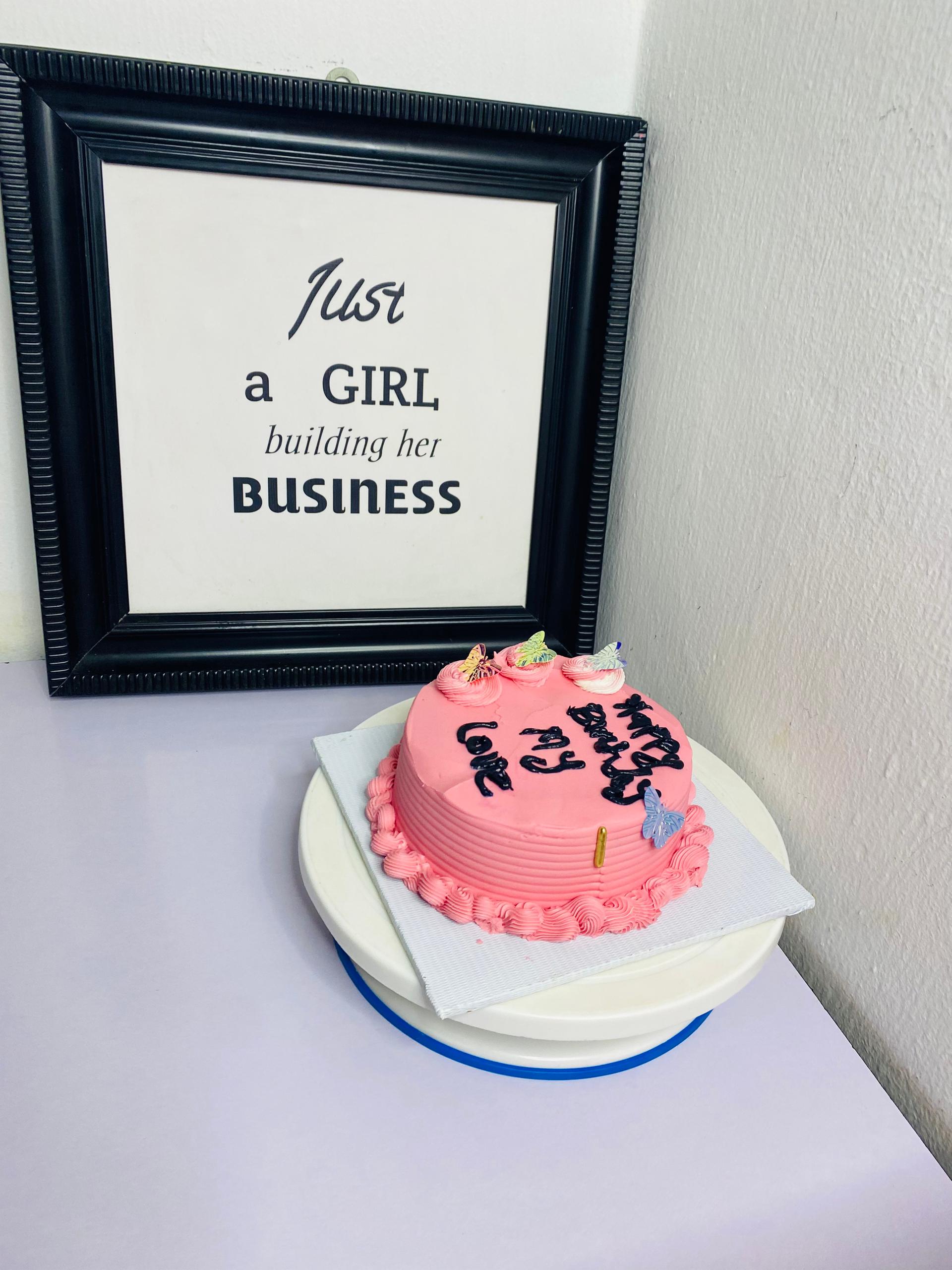 Pink celebration cake with butterflies