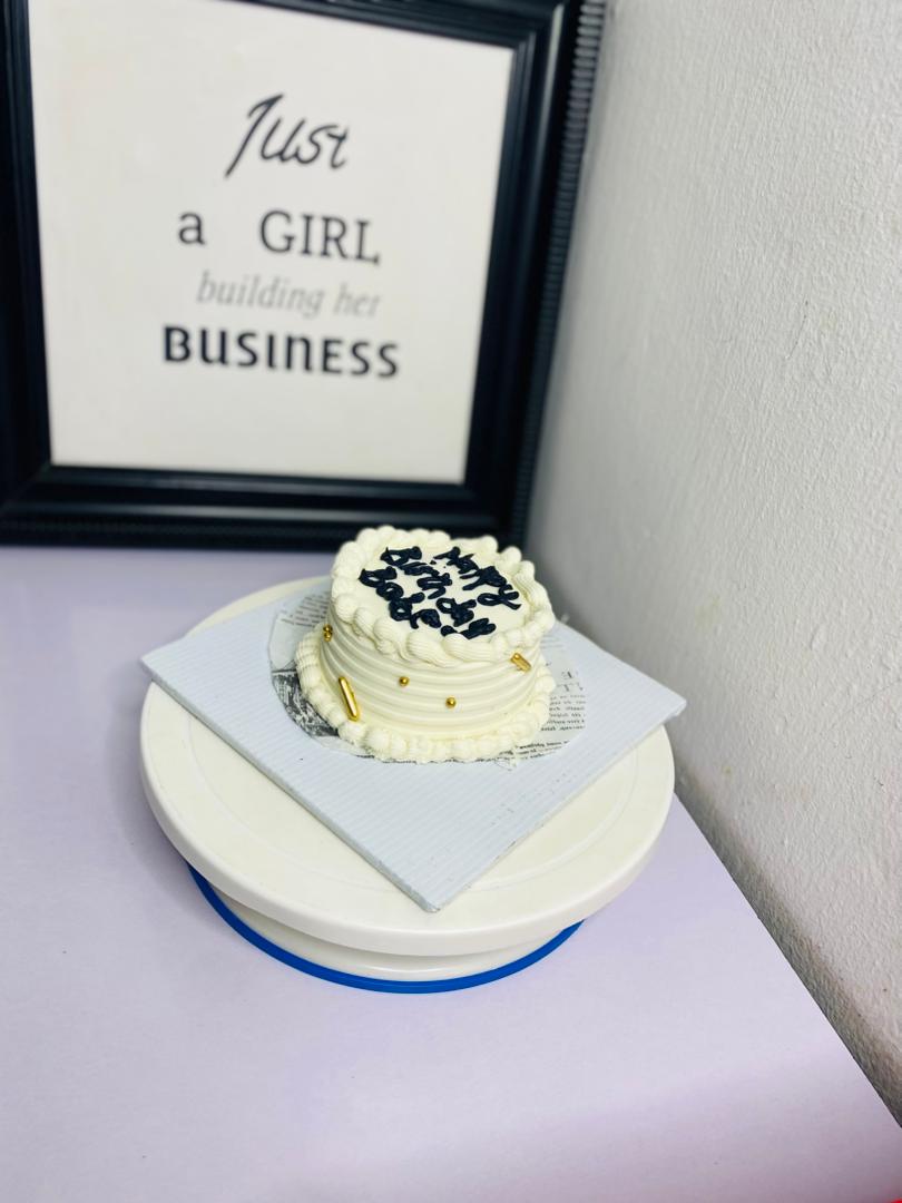 White cake with custom message decoration