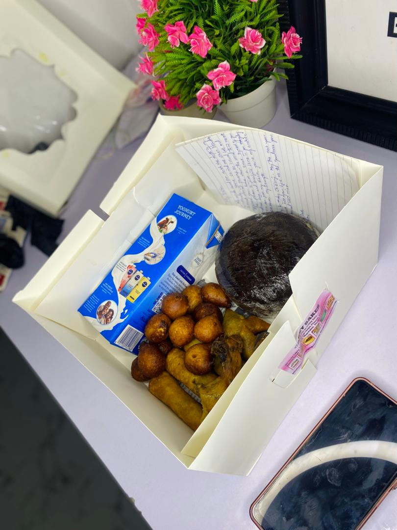 Gift hamper box with snacks and treats